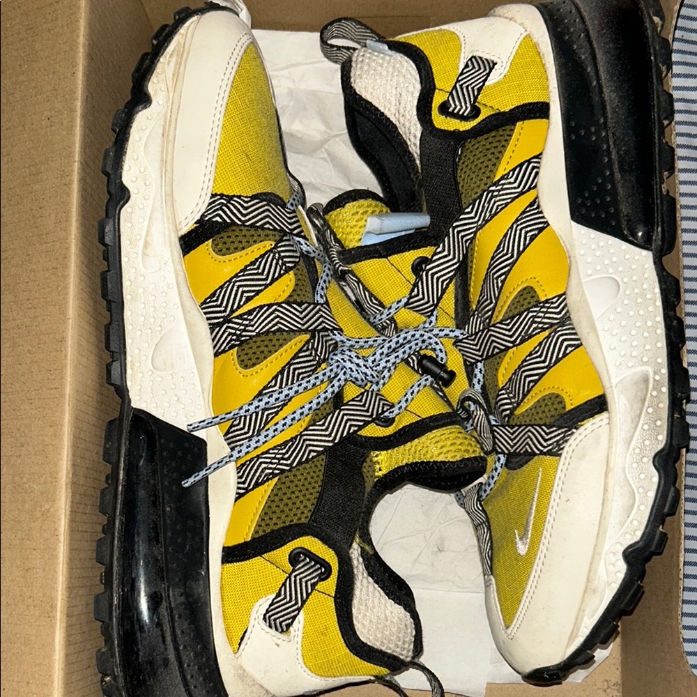 Nike Yellow and Black Sneakers with Modern Design